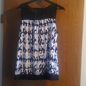 Rickis size large sleevless blue print blouse
